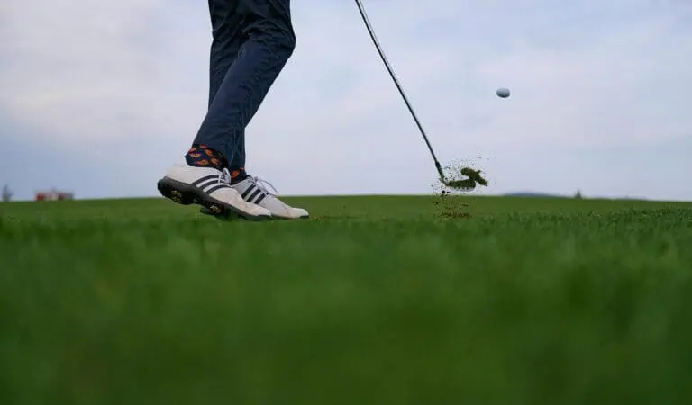 golf ball flying off tee